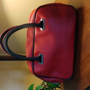 Red Lacoste mini bowler bag